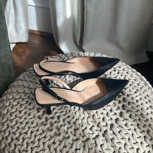 Black Slingback Kitten Heel by Guilhermina. US 9